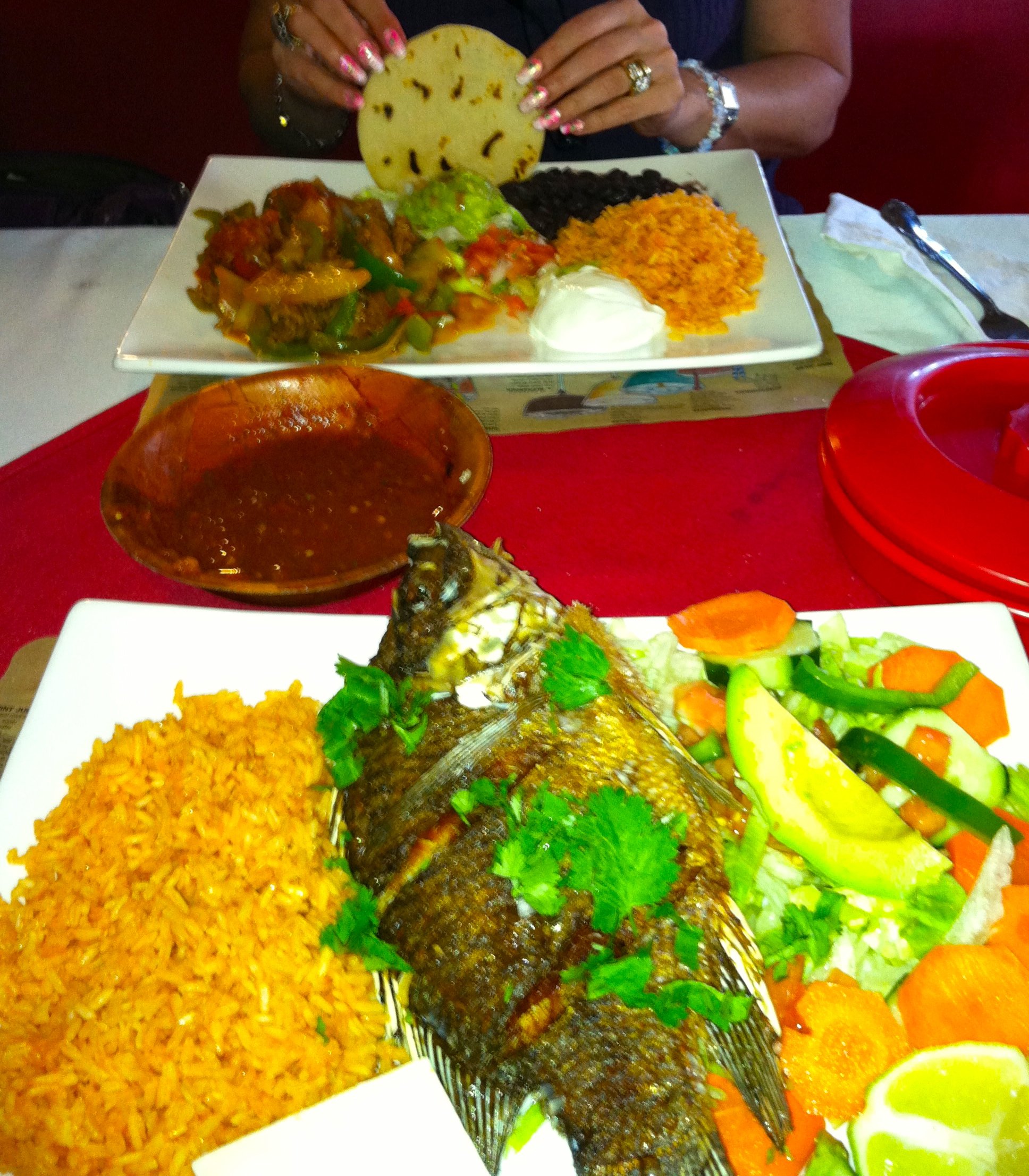 Amazing fried fish at a local restaurant, with Wendy. 